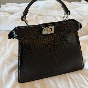 Fendi Peekaboo IseeU in Python